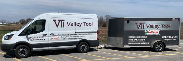 A Valley Tool van towing a trailer of sump cleaning equipment